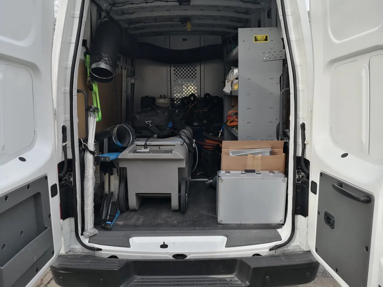 The Air Ducters' professional negative-pressure air duct cleaning equipment, loaded for a Raleigh job
