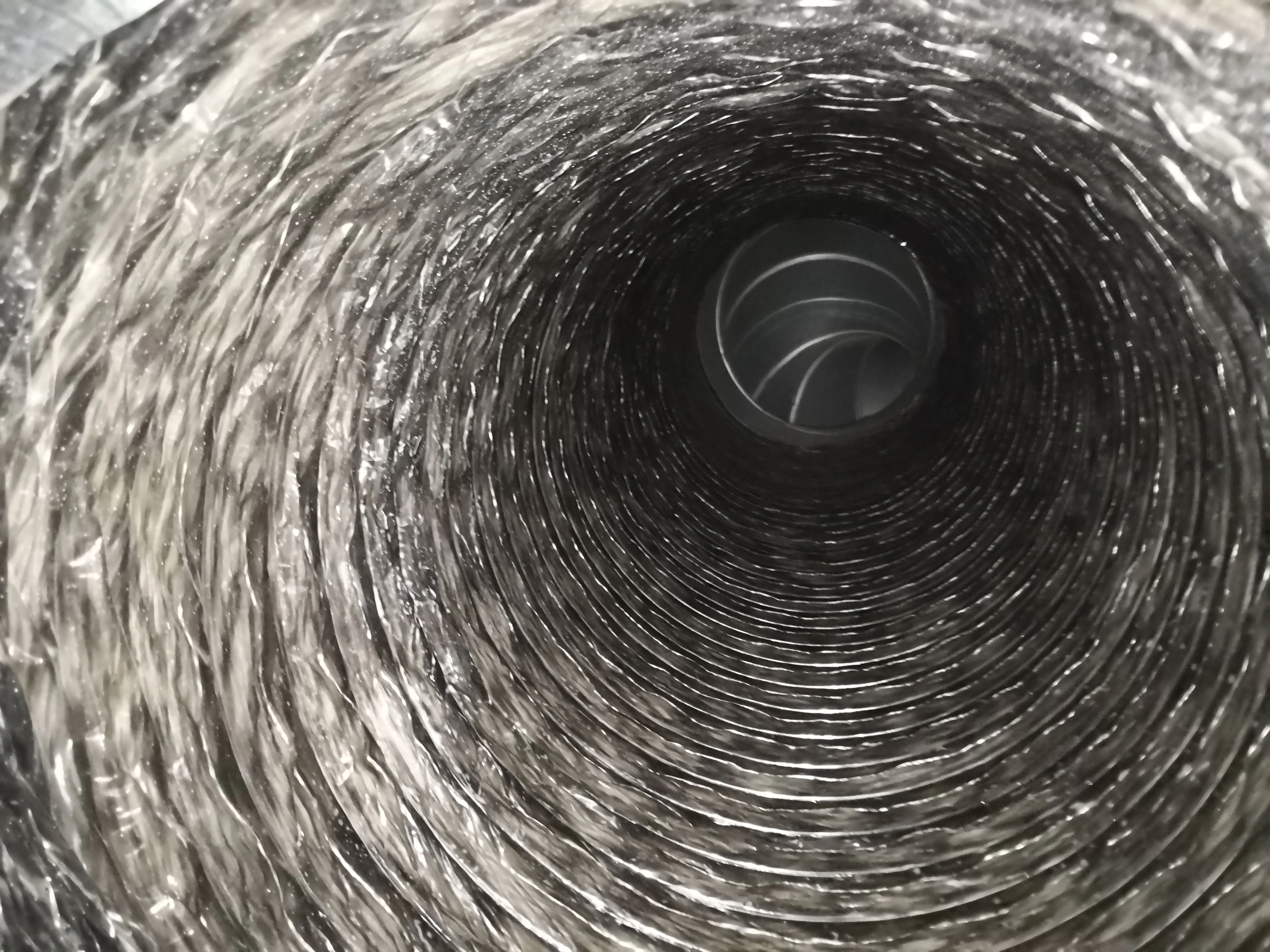 Air duct interior after professional cleaning in Raleigh NC — clean and clear ductwork