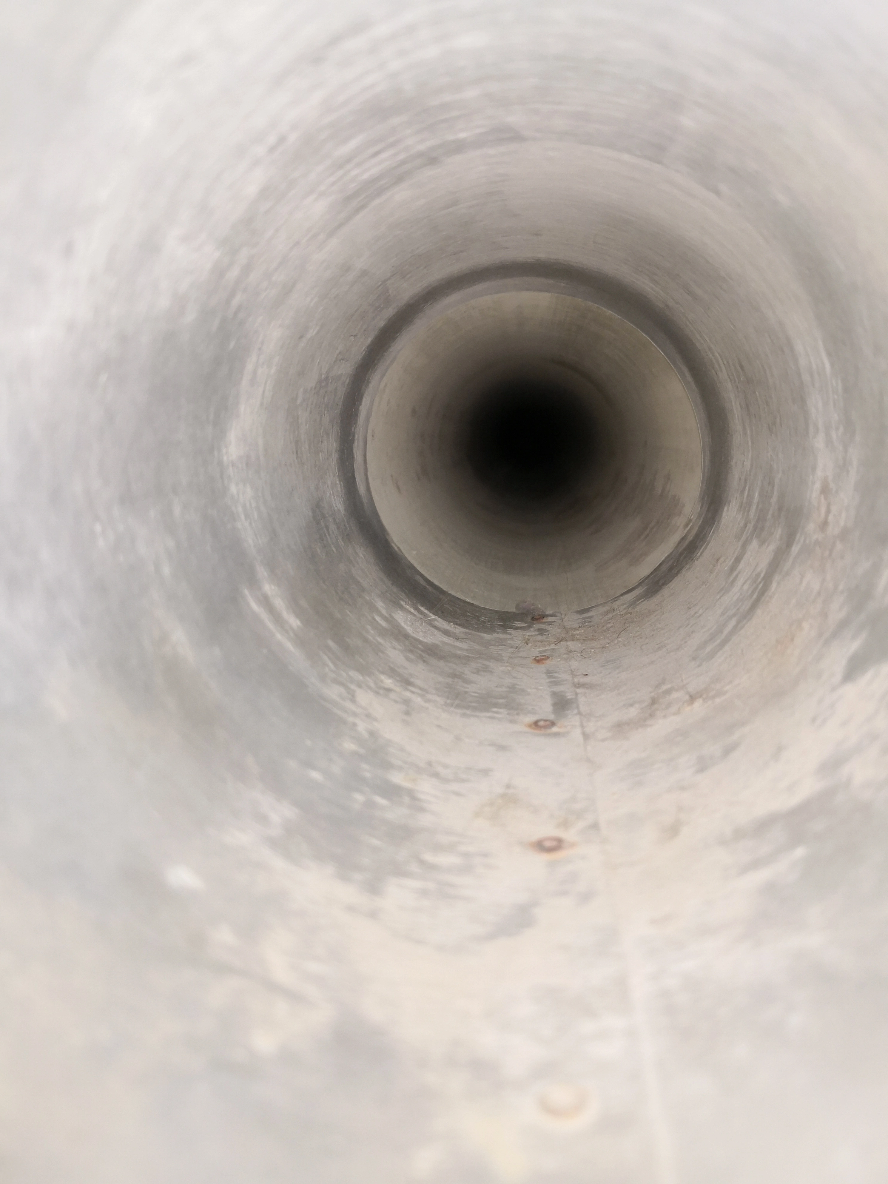 Dryer vent interior after professional cleaning in Raleigh NC — fully clear and restored airflow
