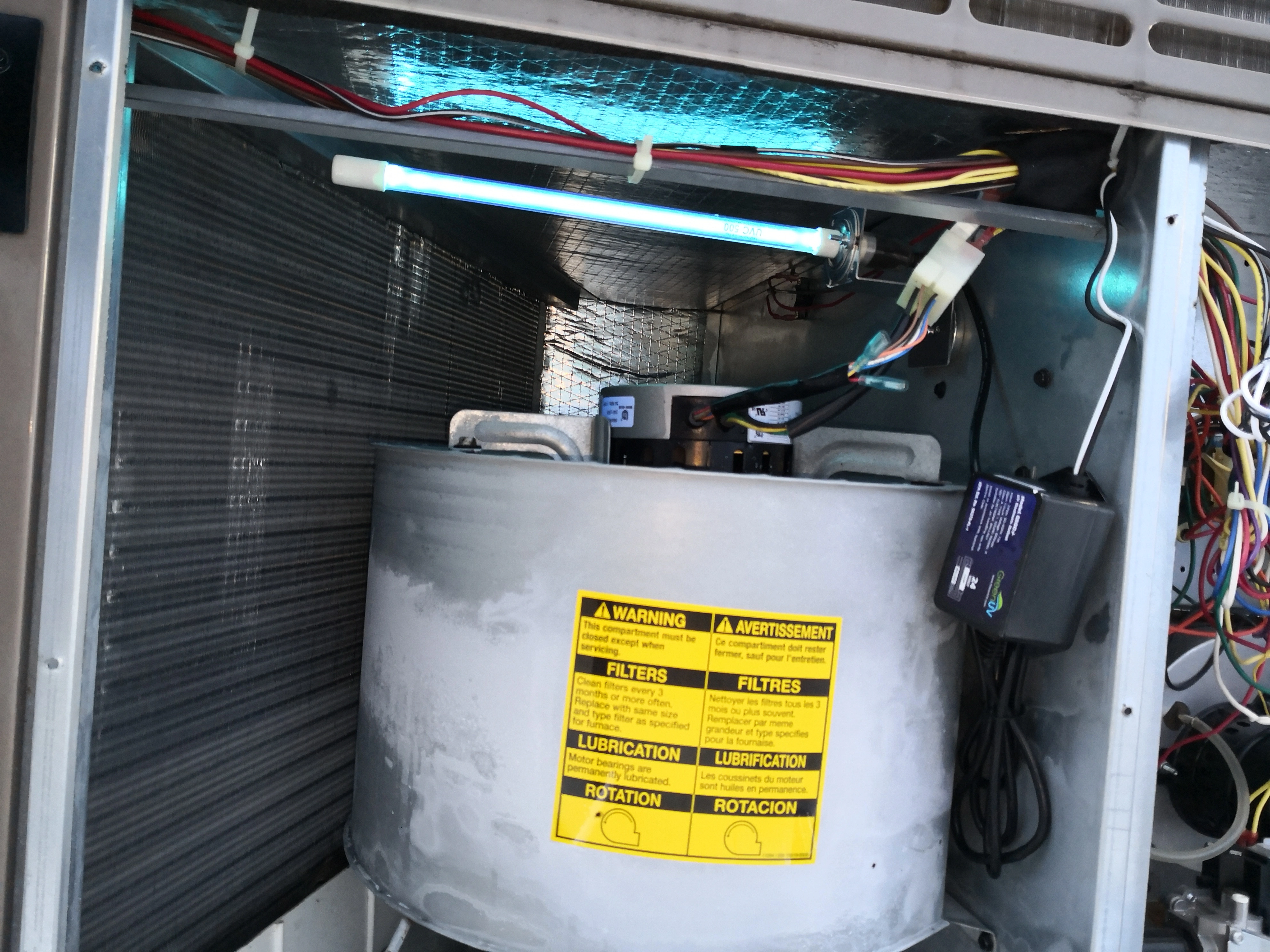 UV-C germicidal light installed at HVAC evaporator coil in Raleigh NC home